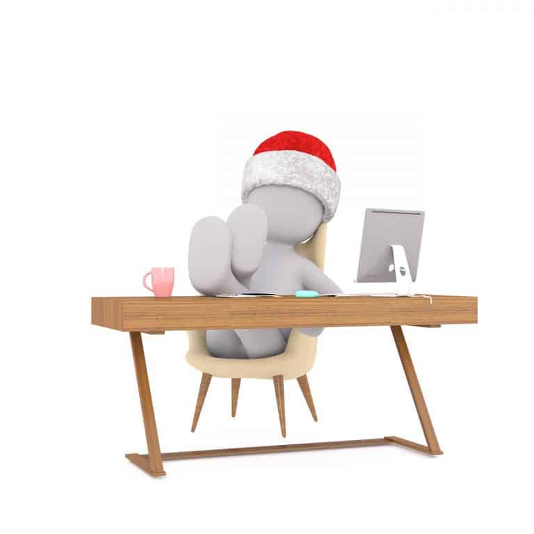 employee with feet up on the desk - employee refusing to work overtime at Christmas