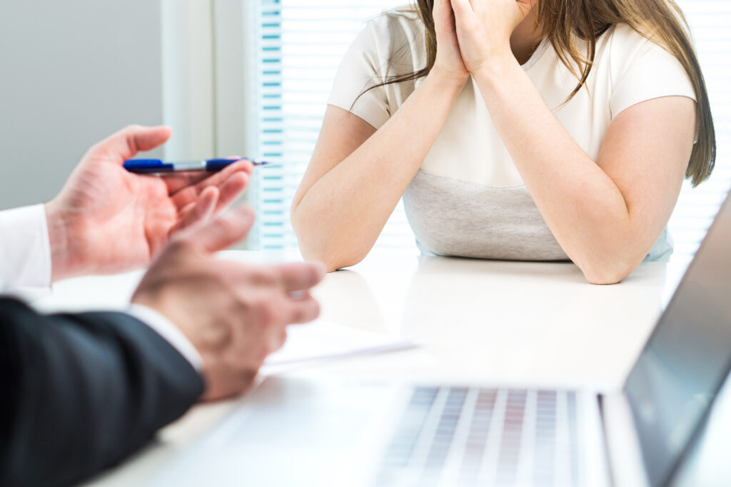 A manager holding a difficult conversation in the workplace