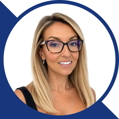 Amy-Hatswell-Headshot- Blue Arrow Down Left Shape
