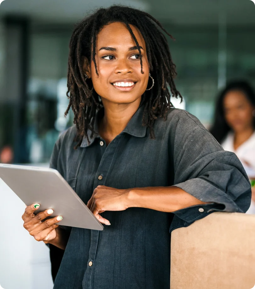 HR adviser reviewing employee records on a tablet