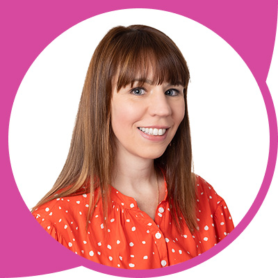 Lucy-Fitzgerald-Headshot-Pink Arrow Up Left Shape