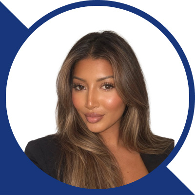 Sheena-Gujadhur-Headshot-- Blue Arrow Down Shape